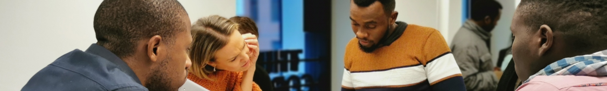 People sitting around desk